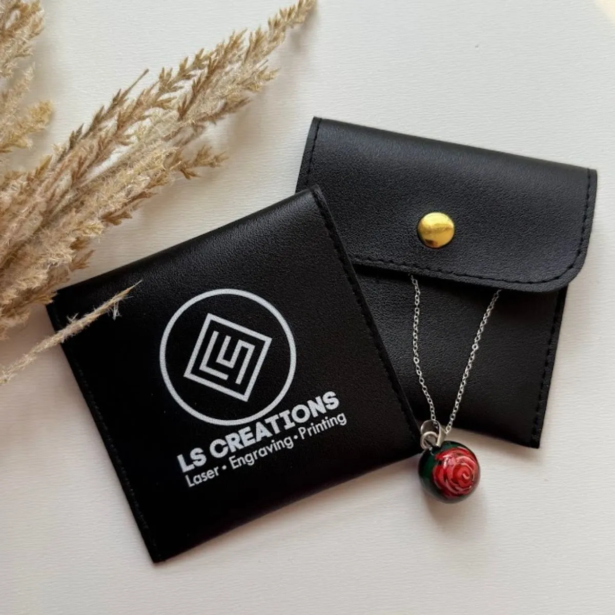 Personalized black jewelry packaging for small business with custom logo