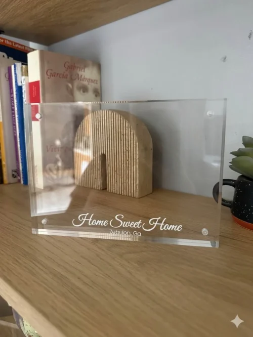 clear acrylic frame with city name